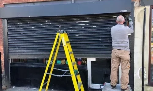 Old Black Roller Shutter Repair London